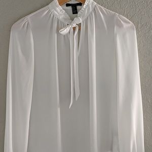 White sheet, silk blouse